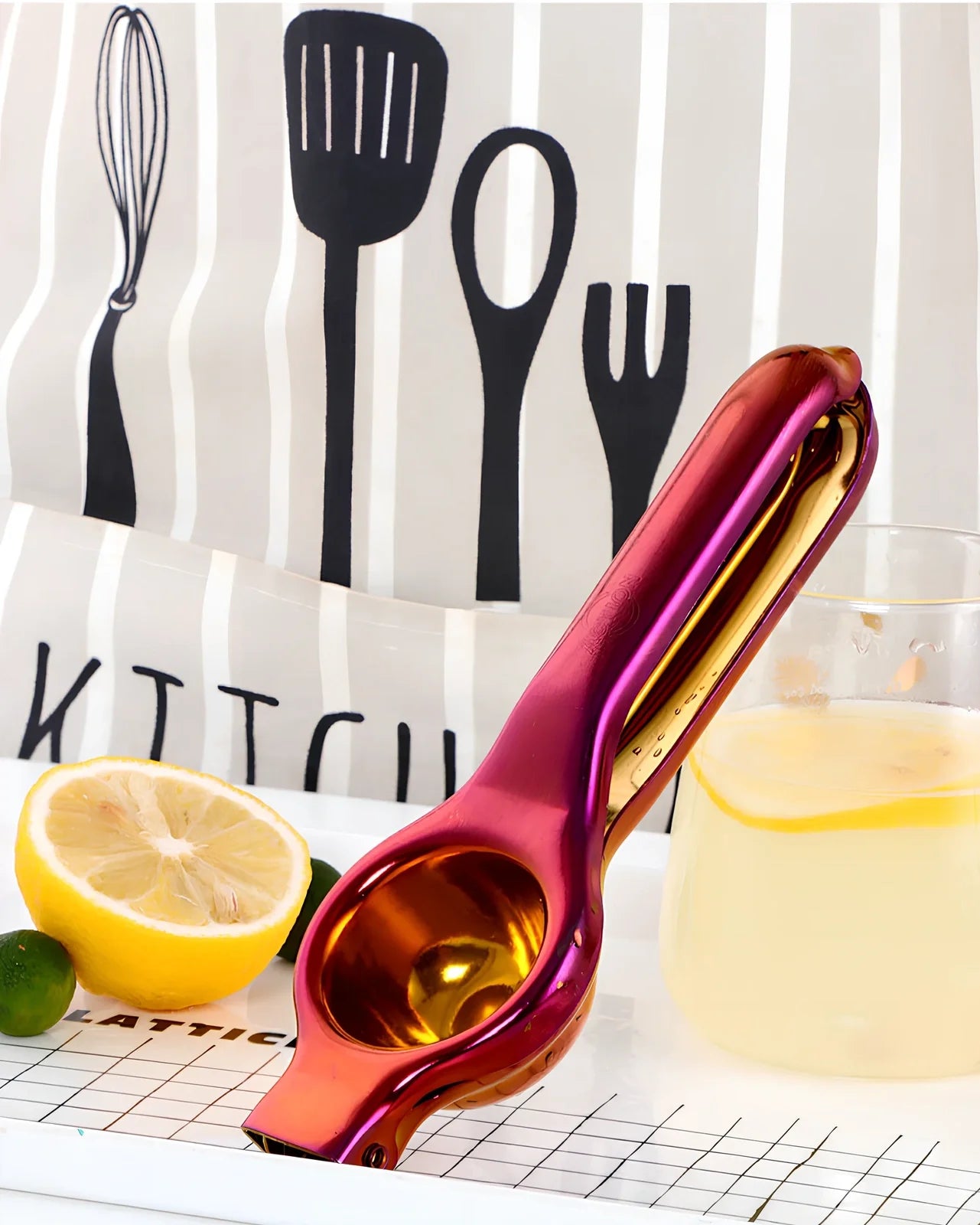 Manual stainless steel juicer with 5.5cm feed opening in gold finish on kitchen counter