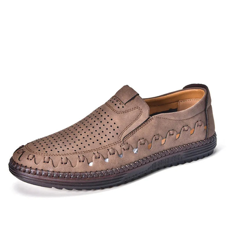 Men's brown slip-on casual shoes with round toe and flat sole shown on a white background