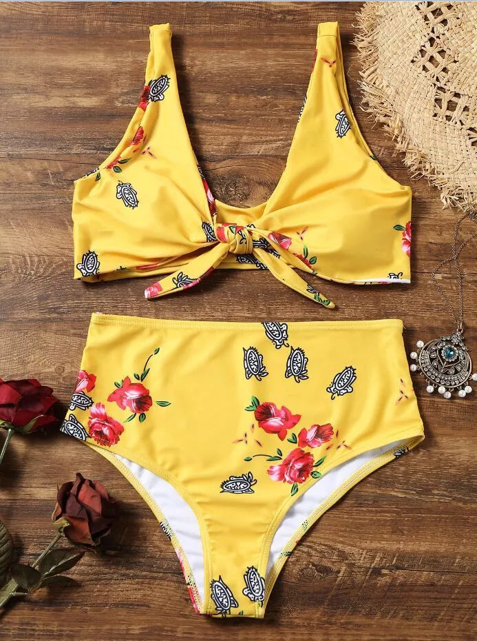 Double-sided knotted bikini swimsuit in yellow, orchid, and white floral patterns