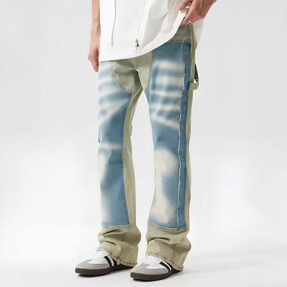 Yellow and blue patchwork splash-ink damaged design denim jeans with mid-waist cut and zip placket closure