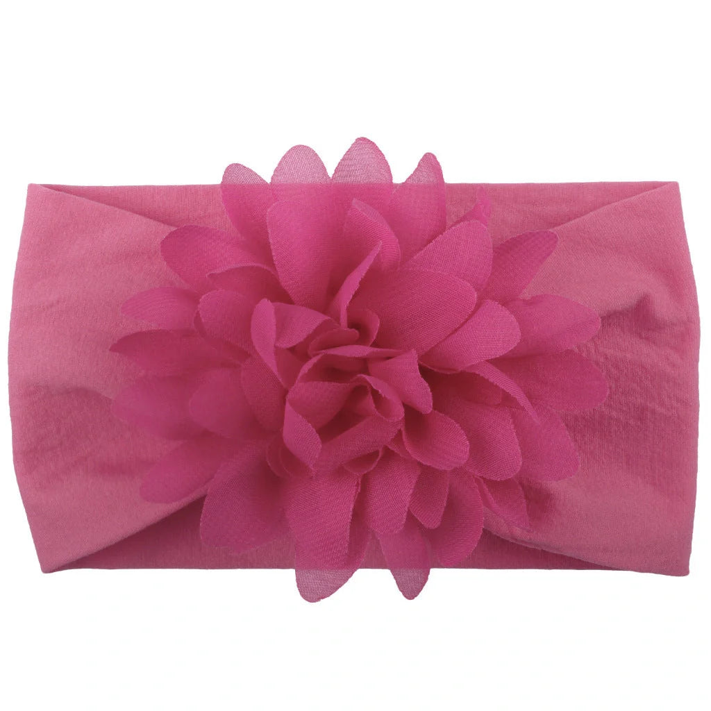 Adorable chiffon flower baby headband for your little princess, available in multiple colors.