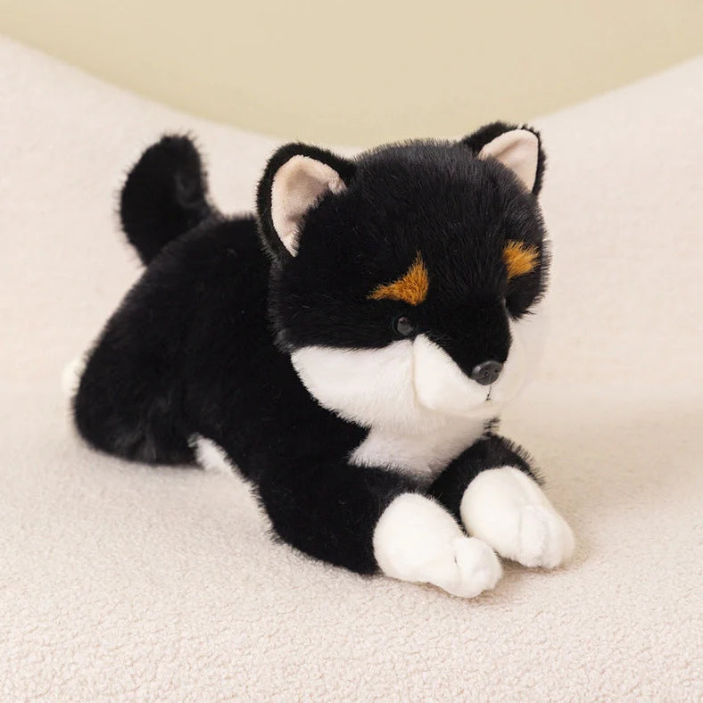 Brown Shiba Inu plush doll in lying position showing super soft short plush texture and natural posture simulation