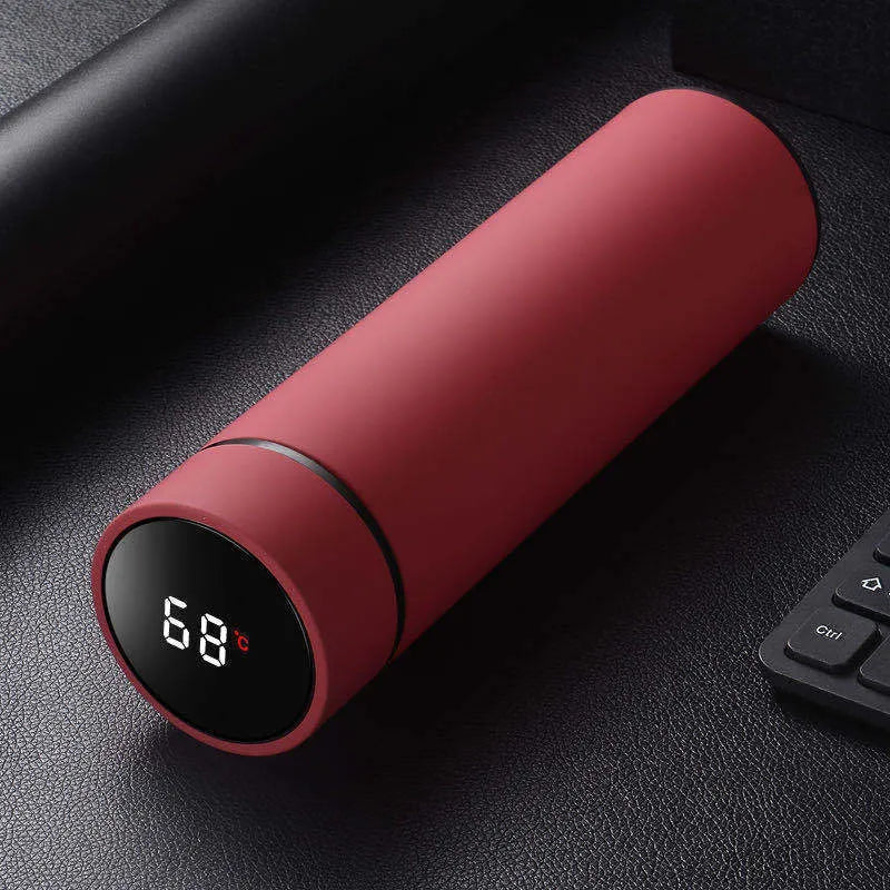 Stainless steel water bottle with double-wall vacuum insulation, shown in black, red, gold, and blue colour options.