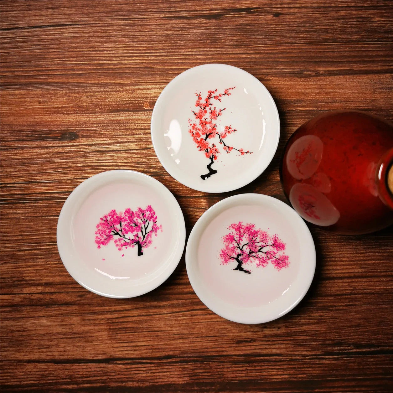 Magic Sakura Cup - Japanese color-changing ceramic teacup with sakura design