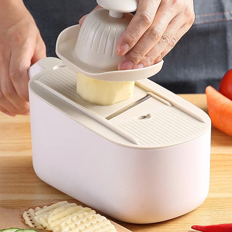 Nordic style kitchen vegetable slicer in blue, grey, or khaki colours with stainless steel cutting components