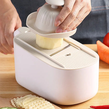 Nordic style kitchen vegetable slicer in blue, grey, or khaki colours with stainless steel cutting components
