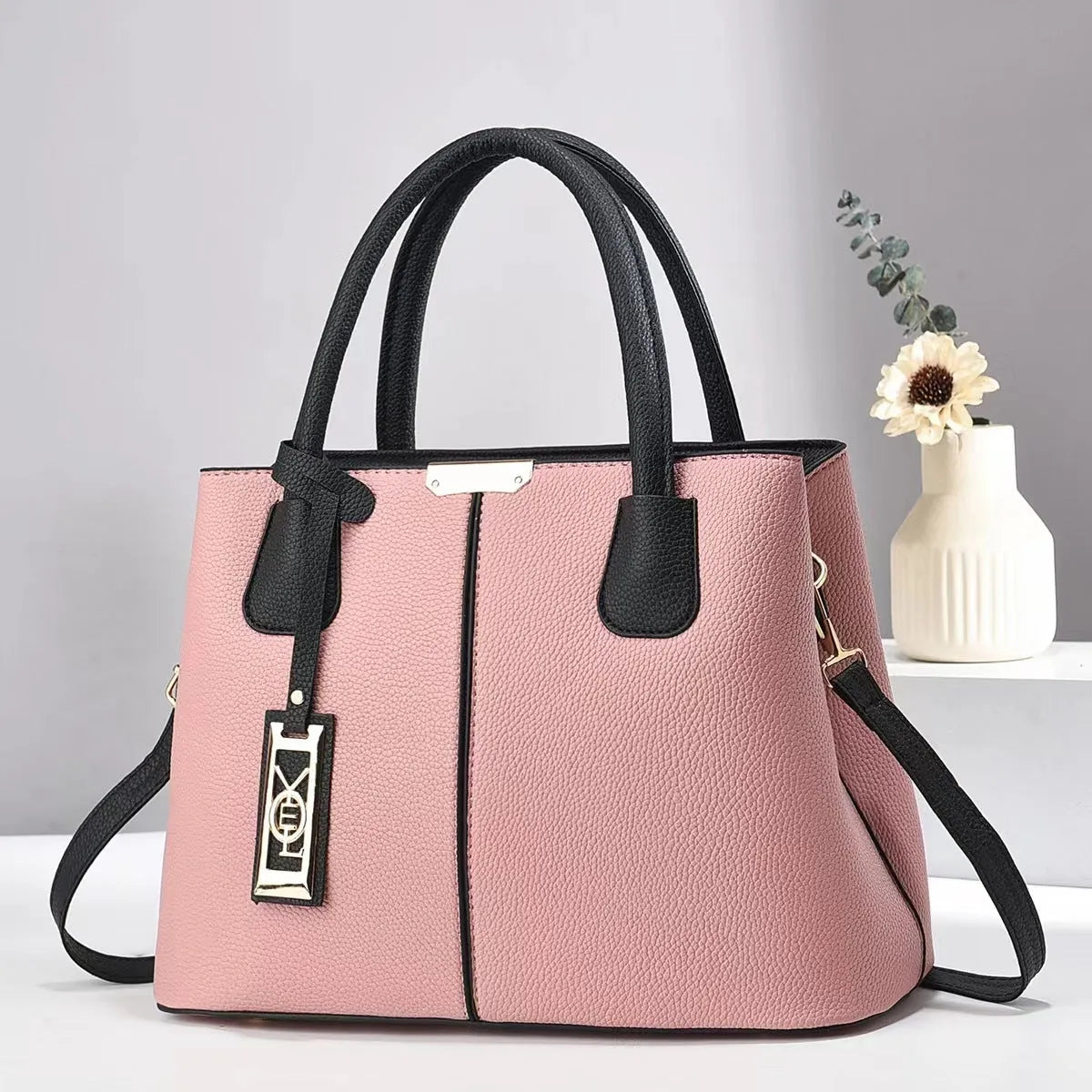 Soft PU leather large capacity shoulder bag in a horizontal square shape with an adjustable strap