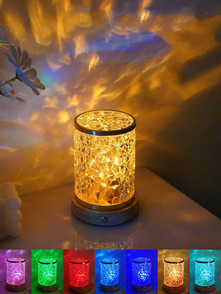 Rotating water ripple night light with acrylic construction and solid wood base measuring 9.5x14.5x10.5cm