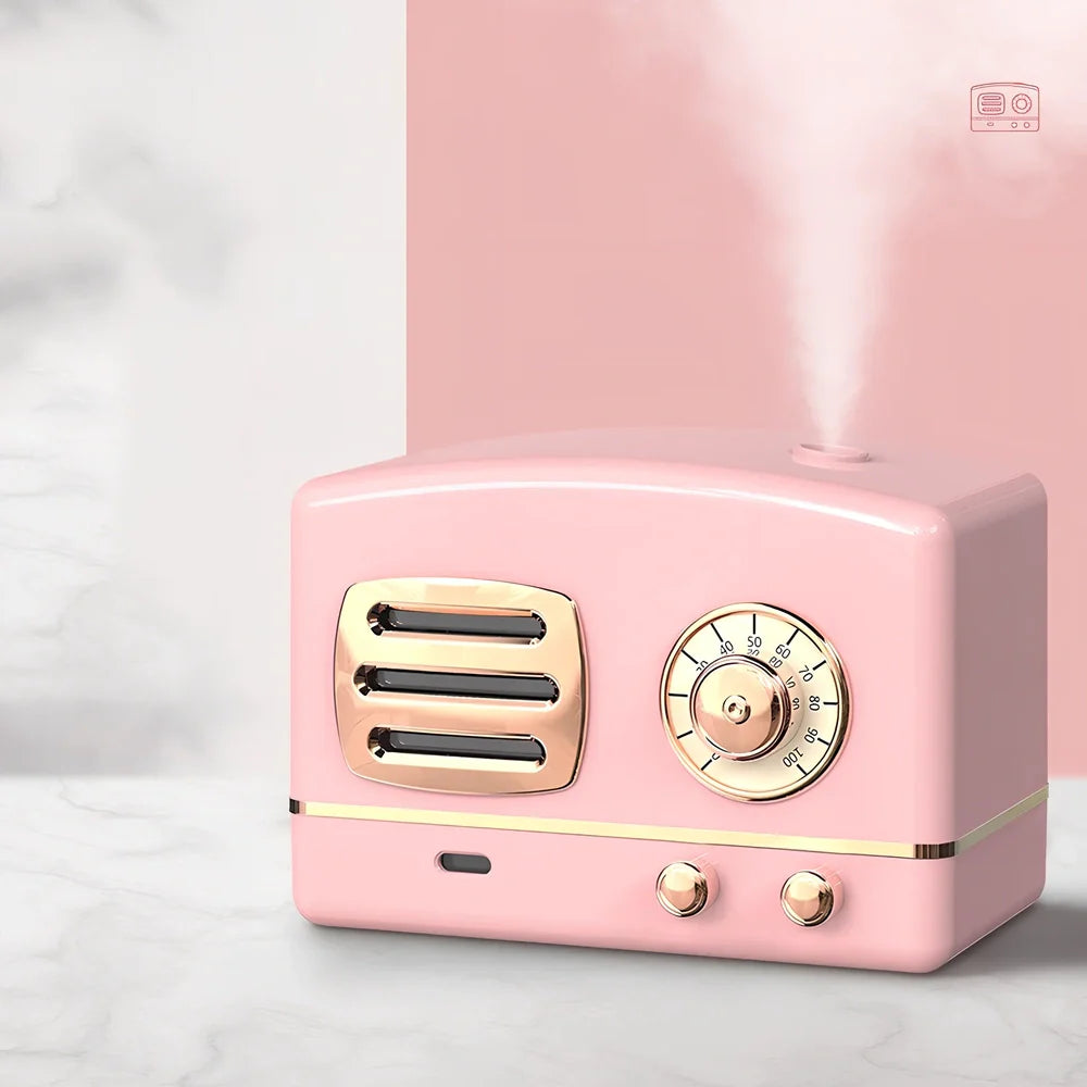 Retro humidifier in green colour with 15cm height and 10cm diameter, showing water tank and control button