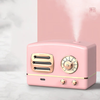 Retro humidifier in green colour with 15cm height and 10cm diameter, showing water tank and control button