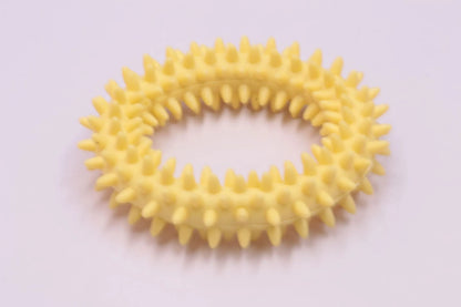 TPR spiky circle ring dog chew toy in assorted colours showing dental cleaning nubs