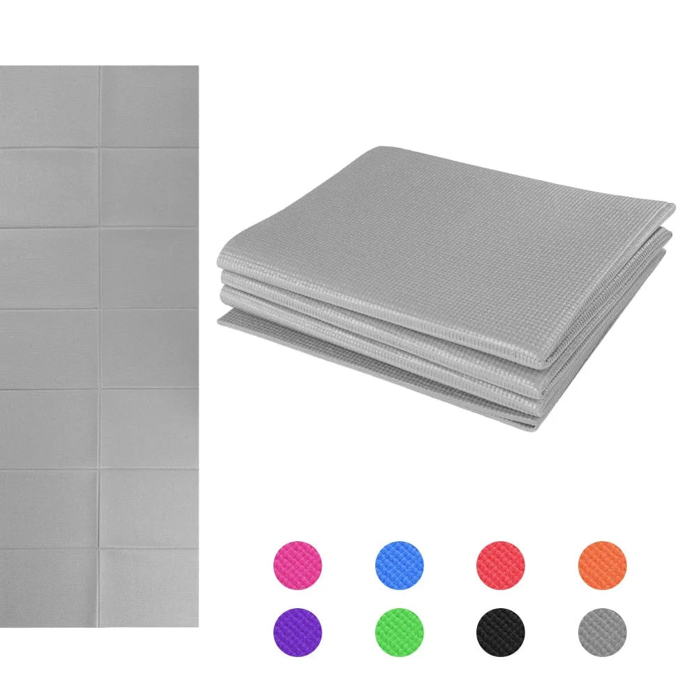 Blue folding yoga mat showing zipper system and handles with 173cm length measurement