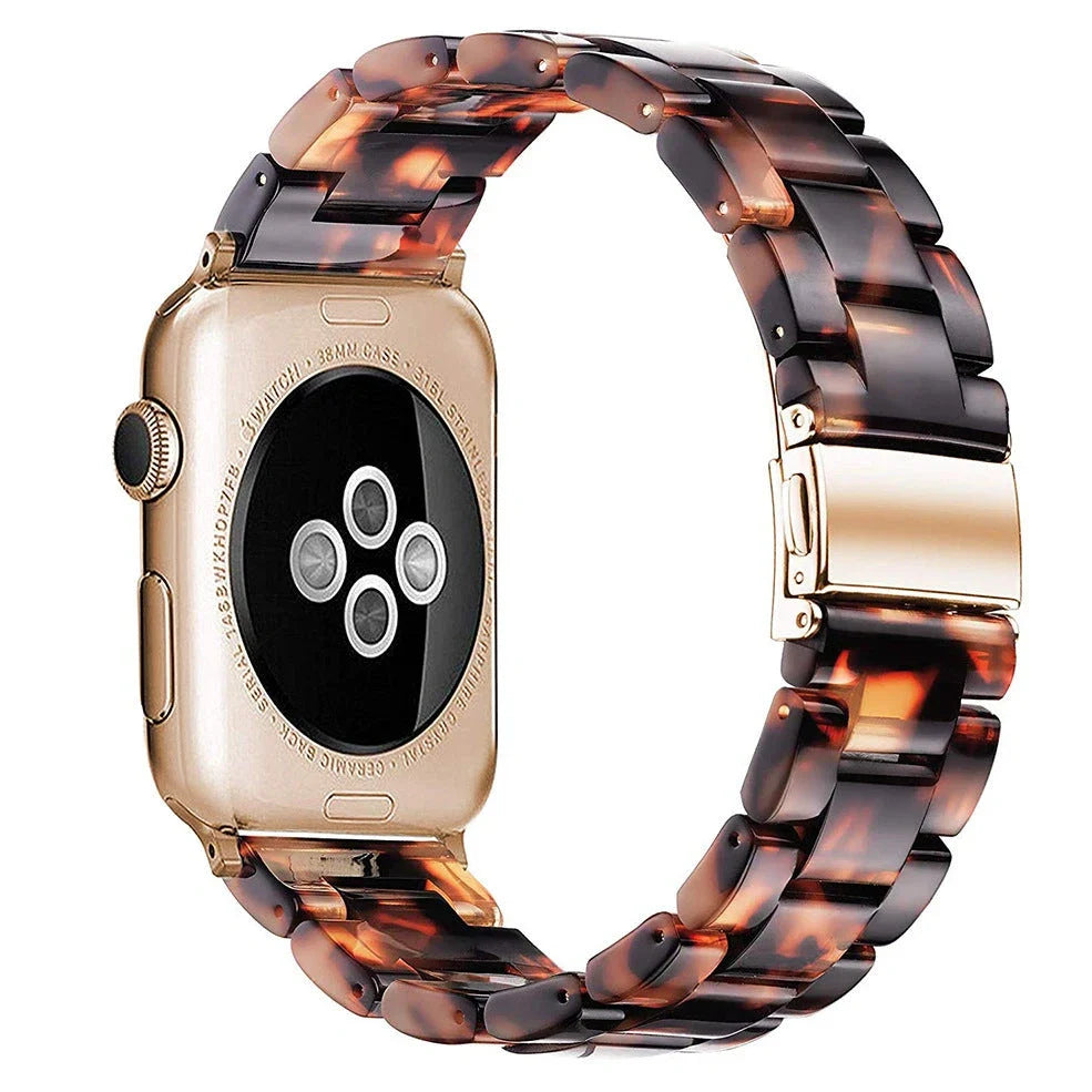 Slim resin Apple Watch strap showing attachment mechanism and colour options