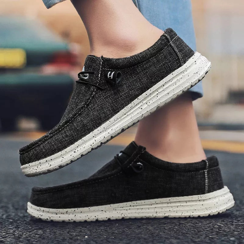 Men's casual canvas loafers in various colors with breathable design and shock-absorbing sole