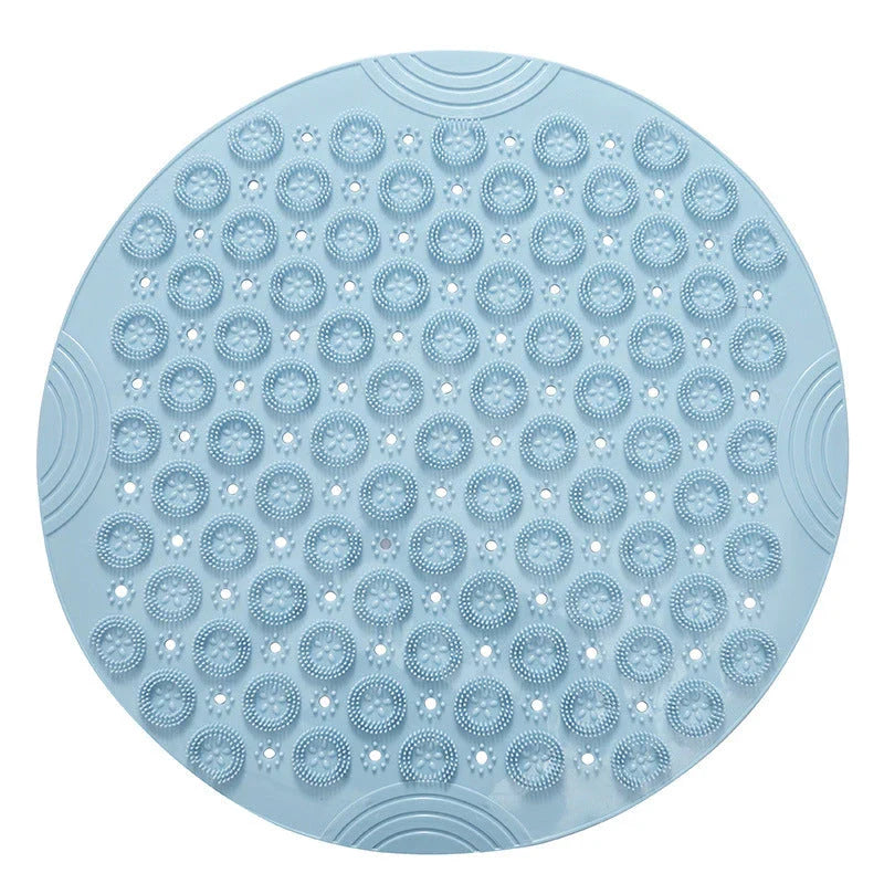 Textured round shower mat with anti-slip surface, massage nodules, and drainage holes for a comfortable and safe bathing experience