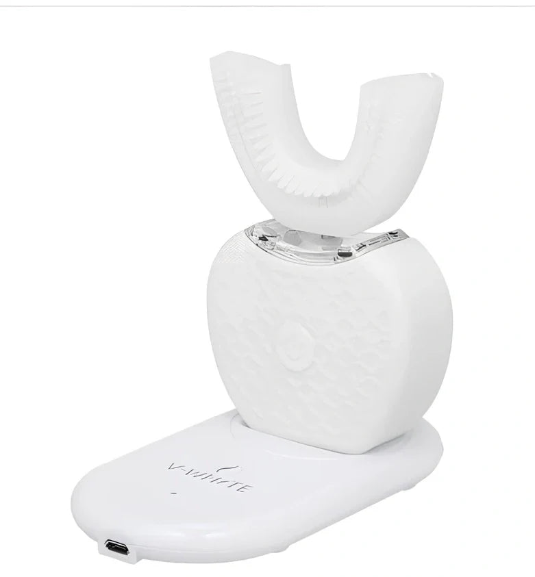 Black ultrasonic electric toothbrush with U-shaped design showing magnetic charging base and USB cable