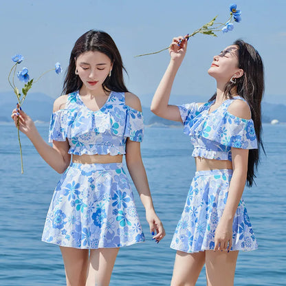 Women's floral blue one-piece swimsuit with fresh small floral pattern on polyester fabric