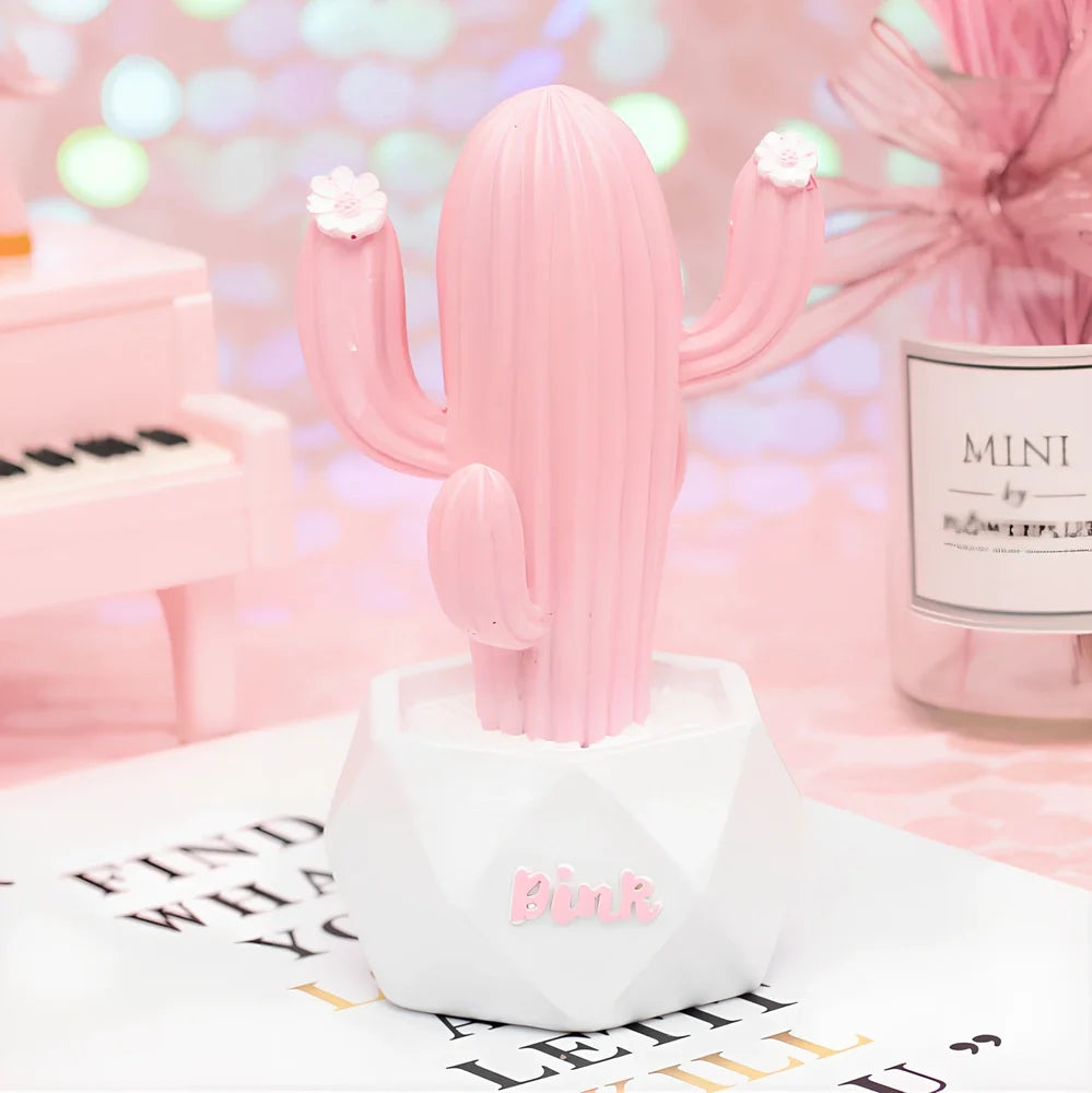 Cactus-shaped resin night light in gold finish measuring 15cm tall with warm LED glow