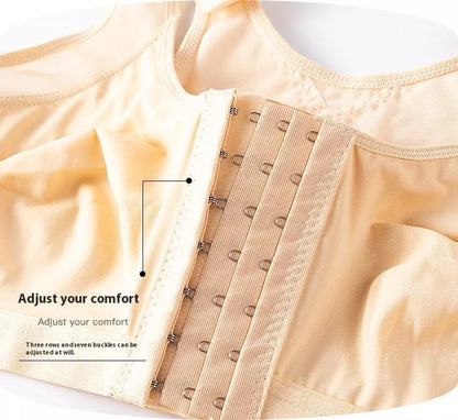 Plus-size front buckle sports bra in white, black, and apricot