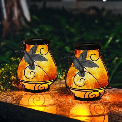Solar-powered outdoor LED garden light with dynamic flame effect in European butterfly design