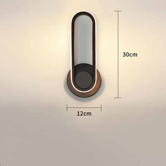 Modern black aluminium bedside lamp with 330-degree rotation adjustment on wooden nightstand