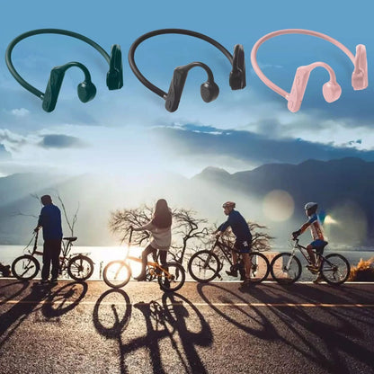 Wireless sports headphones in pink, black, and green with neck-hanging design