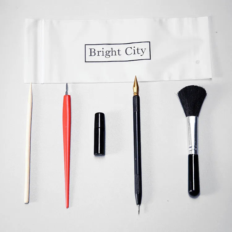 Scratch art repair kit with scraper pen, repair solution, brush, small scraper, and bamboo stick components