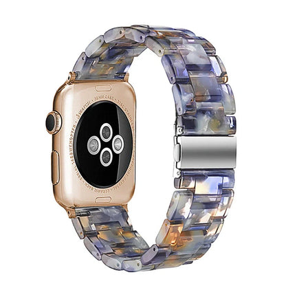 Slim resin Apple Watch strap showing attachment mechanism and colour options