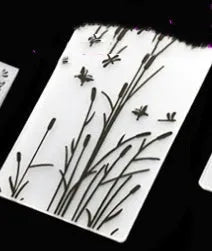 Set of ten plastic cake decorative moulds showing windmill, star, flower, and butterfly patterns.