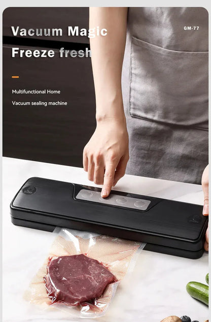 White automatic vacuum sealer on a kitchen counter, showing compact design with one-touch button for food preservation.