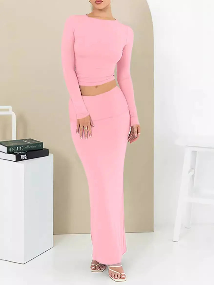 Women's black polyester two-piece suit with a sweet style, featuring a top and long skirt in a slim fit.