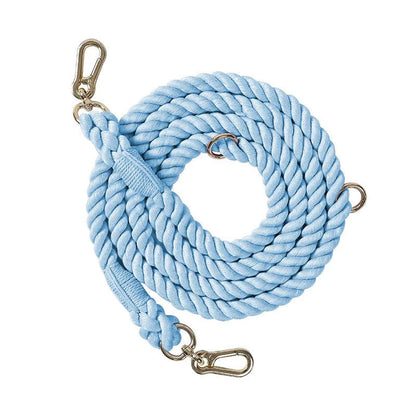 Woven rainbow pattern dog leash with double grip handles and a metal clasp.