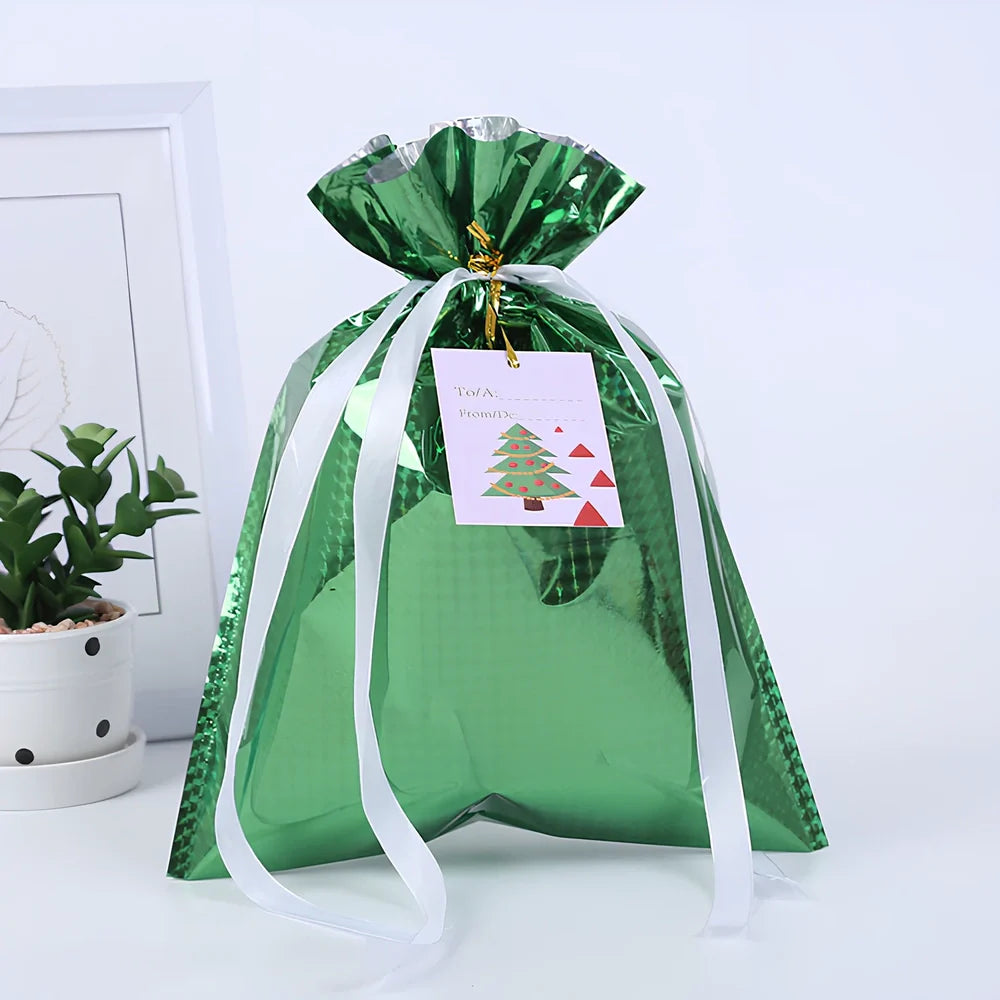 Christmas gift bag with drawstring closure in laser gold finish, 32x24cm dimensions