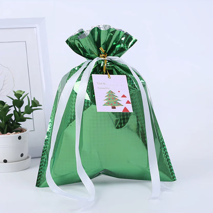Christmas gift bag with drawstring closure in laser gold finish, 32x24cm dimensions