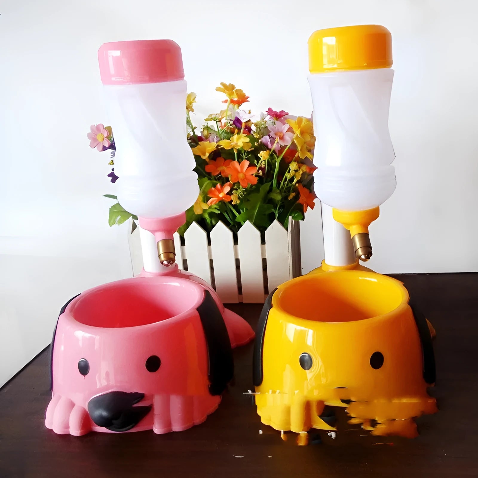 Adjustable height pet drinking bowl in blue, pink, and yellow colours with rod lifting mechanism