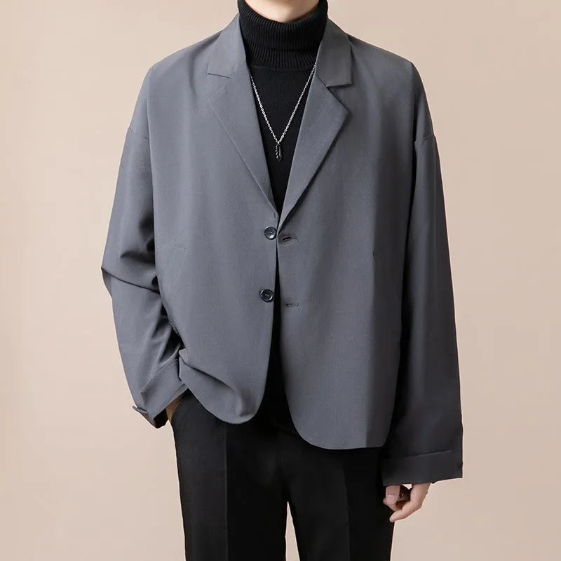 Casual loose-fit suit jacket in light business style, available in multiple colours and sizes.