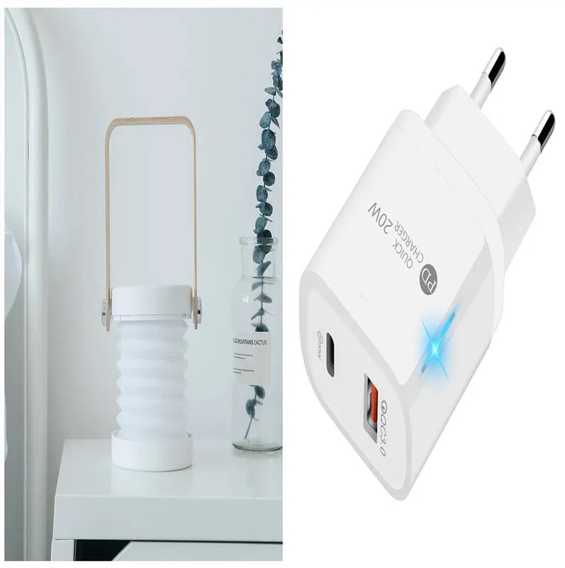 White foldable USB rechargeable LED night light in both table lamp and tall lantern modes.