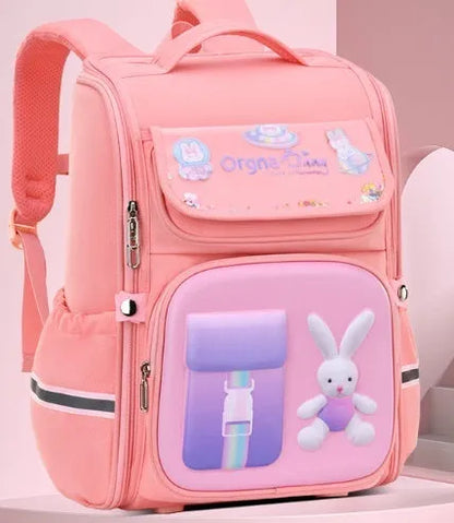 Children's cartoon backpack with airpillow straps in rabbit pink colour showing size comparison