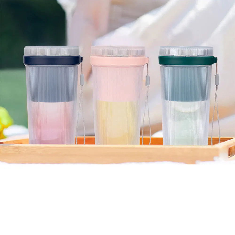 Portable USB rechargeable blender cup in blue, green, or pink with 300ml capacity and detachable blades