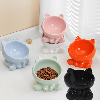 Black and white ceramic cat bowl with oblique mouth and neck guard for reduced whisker fatigue