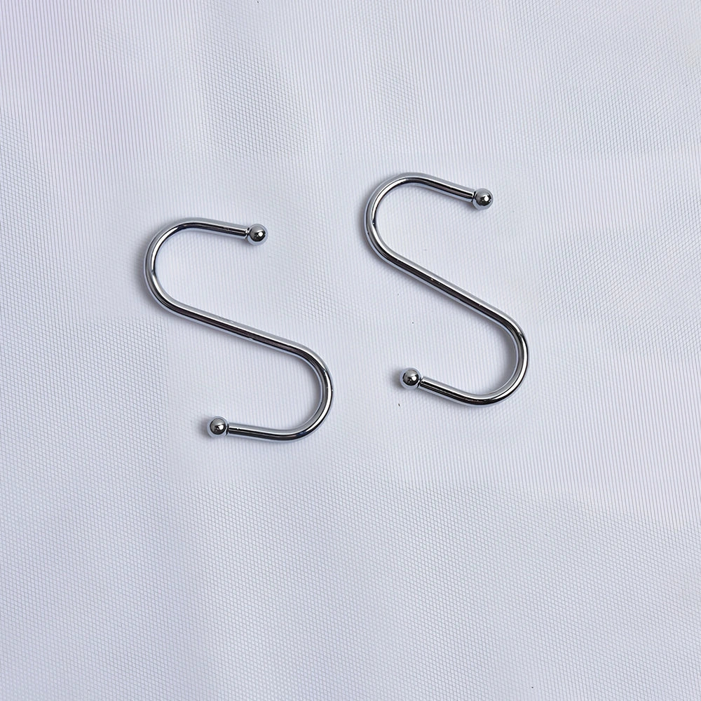 Hand-knitted cotton flowerpot net bag showing mesh pattern and hanging installation