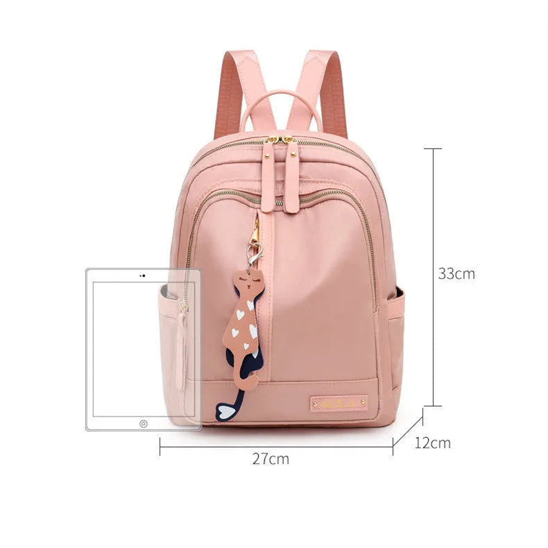 Black square vertical nylon backpack with double shoulder straps showing multiple compartments and anti-theft features