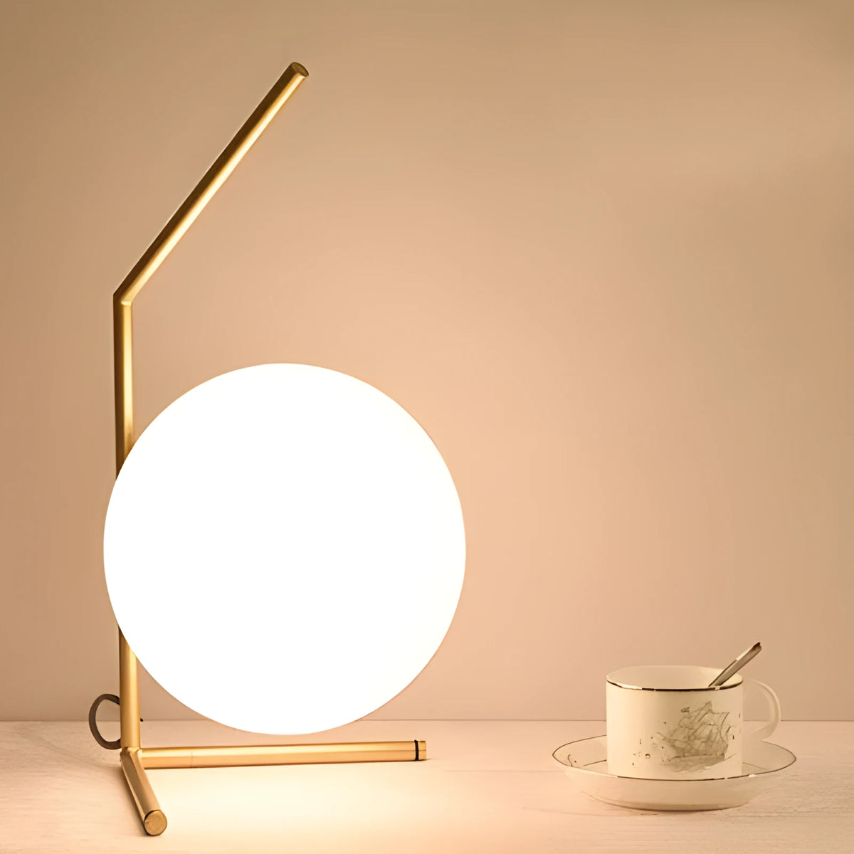 Creative glass table lamp with LED light in one of three available sizes for a living room or study