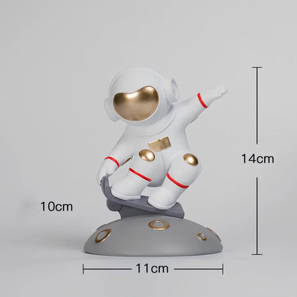 Hand-carved resin astronaut decoration in red or white with handstand, meditate, or skateboard poses