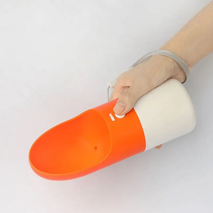 White and grey rocket-shaped pet water bottle with drinking outlet and lock button