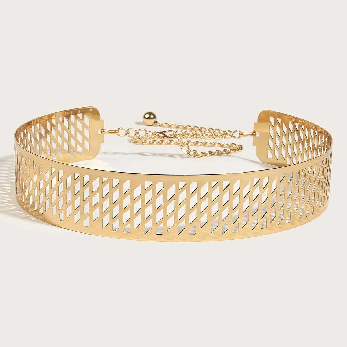 Golden waist belt with lantern floral punch design showing thick 4.5cm width and alloy buckle