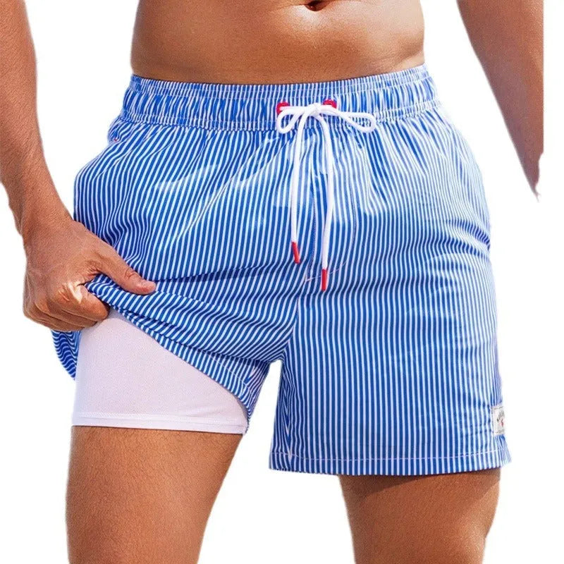 Men's loose quick-drying boxer swimming trunks in spandex fabric with various colour patterns