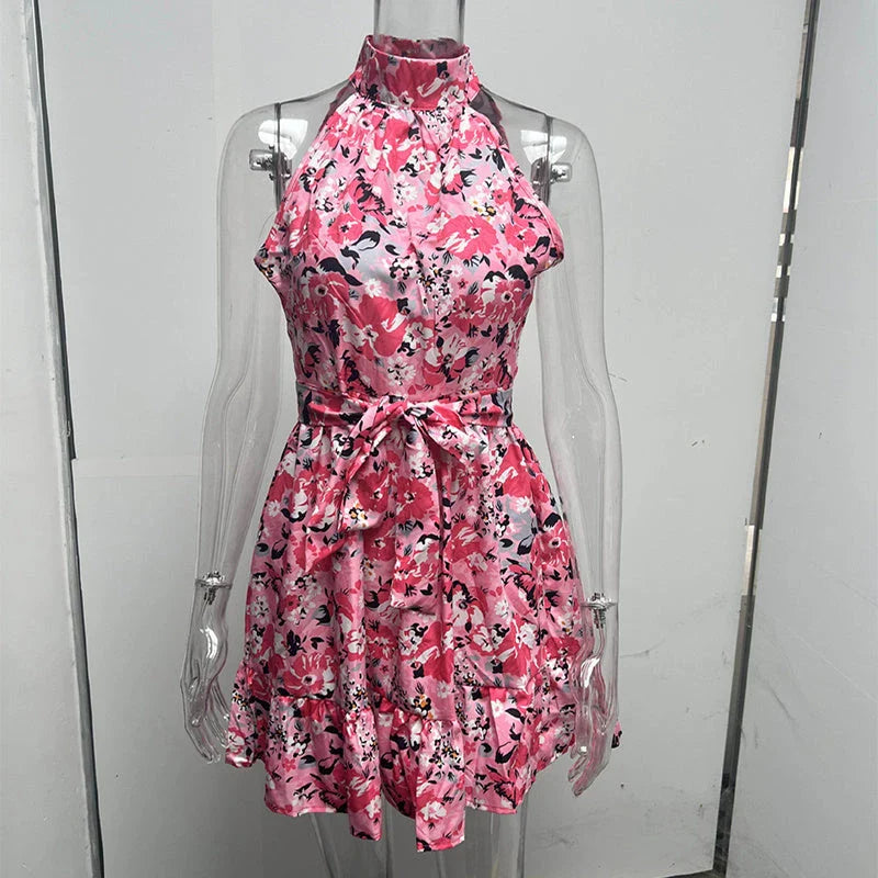 Stylish floral halter dress for women with ruffled details and lace-up back, available in various colors