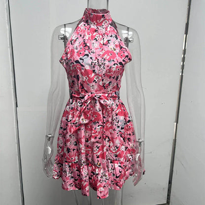 Stylish floral halter dress for women with ruffled details and lace-up back, available in various colors