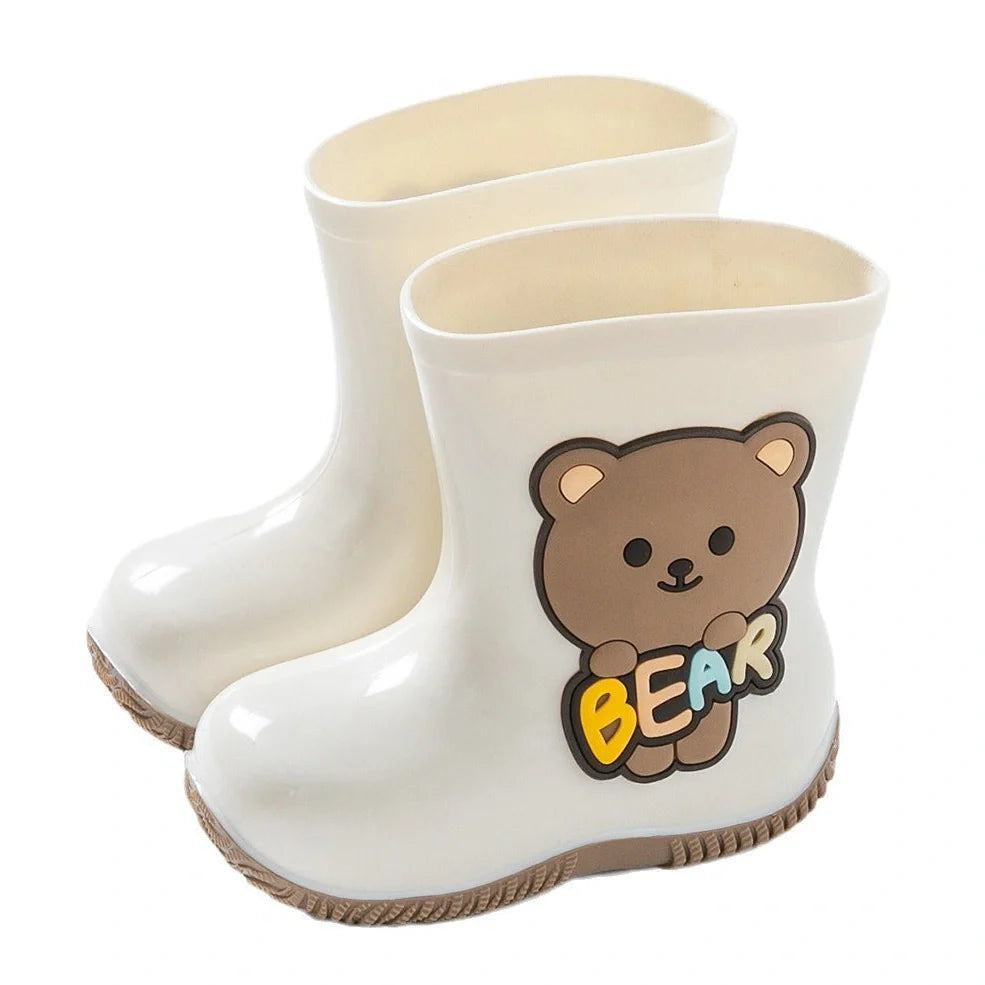 Children's PVC rain shoes with cartoon bear design showing waterproof construction and low heel